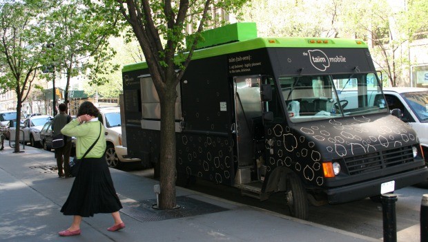 This passerby seemed to be color-coordinated with the Taino food truck, parked on Hudson Street. 
